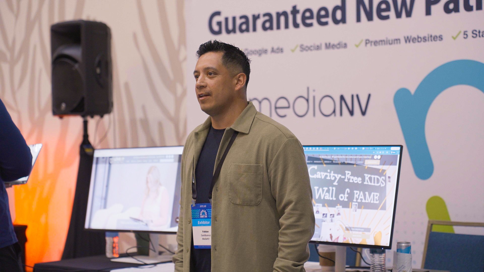 MediaNV exhibitor at the conference booth